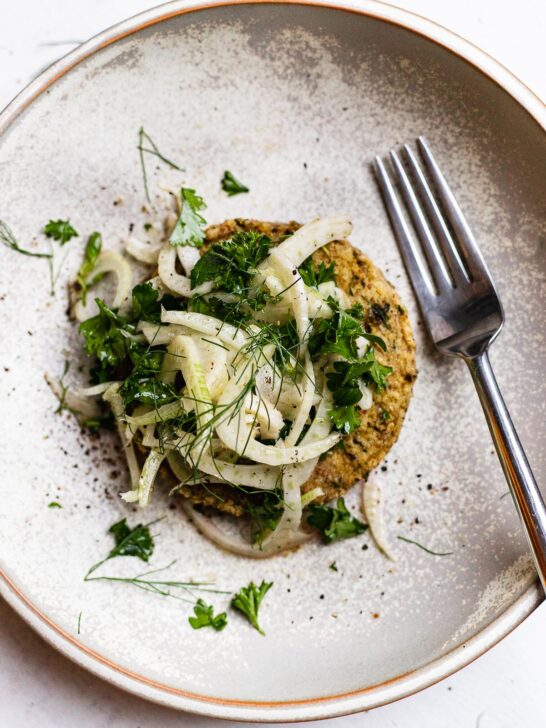 shaved fennel slaw on top of a veggie burger